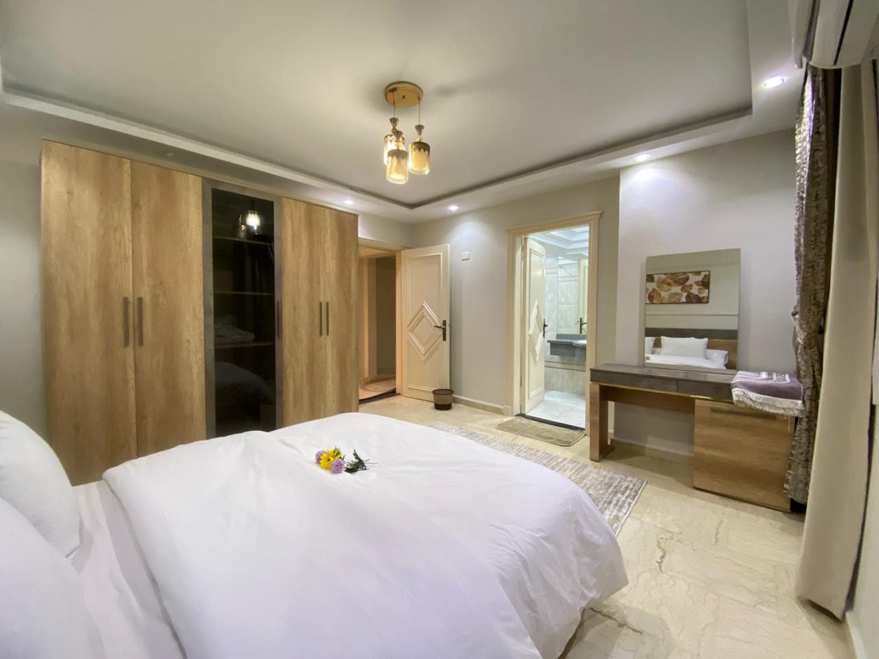 غرفة نوم رئيسية في شقة فندقية في المنيل غرفة نوم رئيسية في شقة فندقية في المنيل